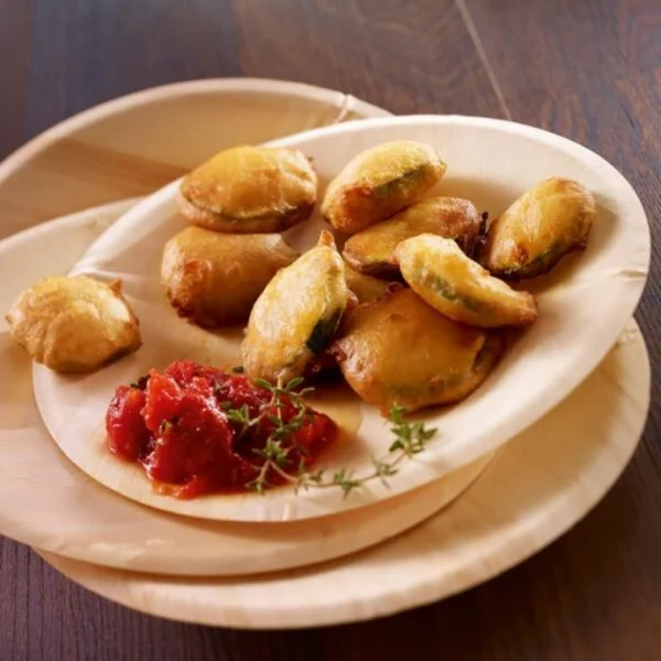 Beignets de courgettes, coulis de tomates et thym frais