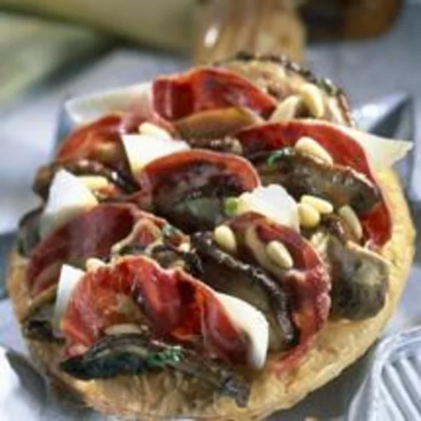 Tarte aux champignons et fines tranches de jambon cru